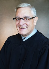 Senior Judge John E. DeSanto