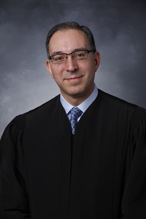 Judge Nelson L. Peralta