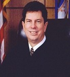 Senior Judge John R. McBride