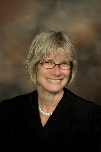Senior Judge Kathryn Davis Messerich